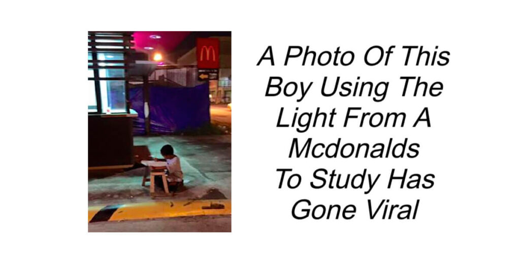 Boy Using The Light From Mcdonalds To Study