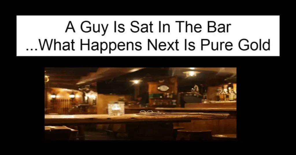 A Guy Is Sat In The Bar