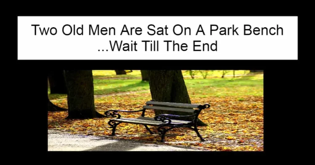 Two Old Men Are Sat On A Park Bench
