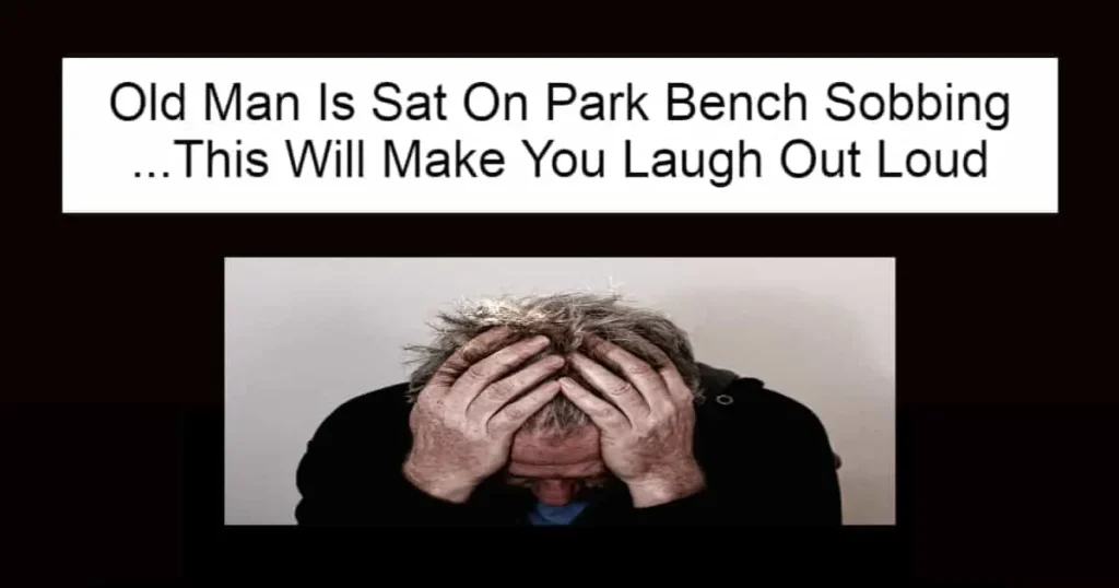 Old Man Is Sat On Park Bench Sobbing
